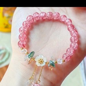 BRAND NEW ** JUST LISTED ** BEAUTIFUL PINK BEADED BRACELET WITH HANGING CHARMS